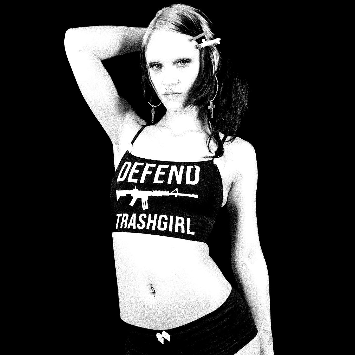 Black and white image of a person wearing a tank top with text and an graphic design.